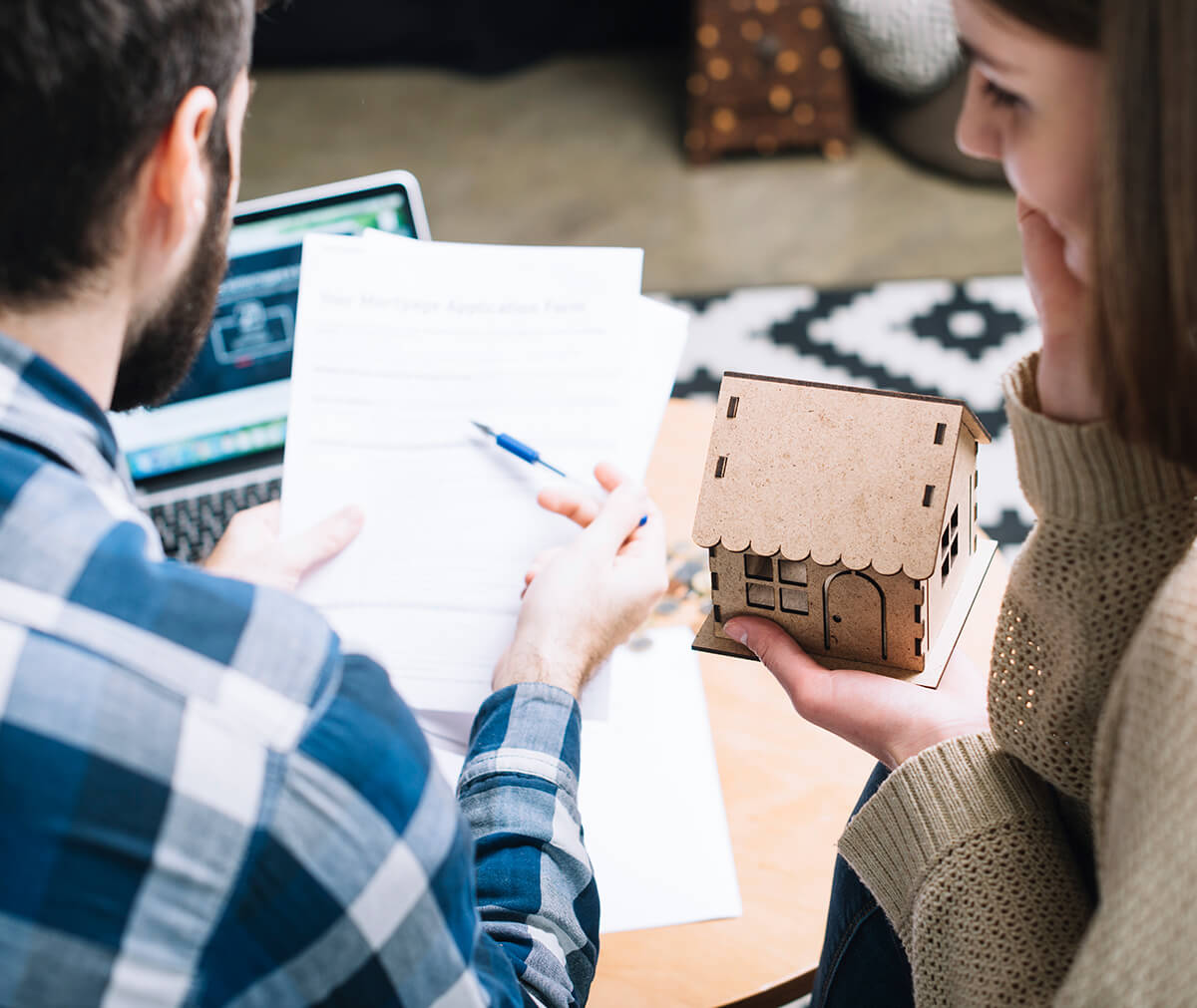 Home buyers reviewing listings