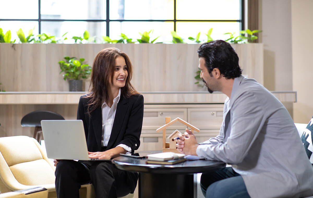 Real estate agent reviewing home selling strategy